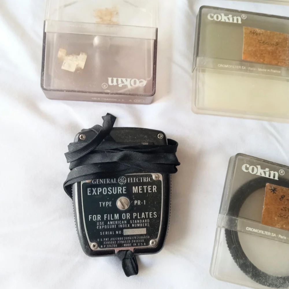 Nikon SLR Camera and Lens Kit with Tan Carry Bag and Black Body